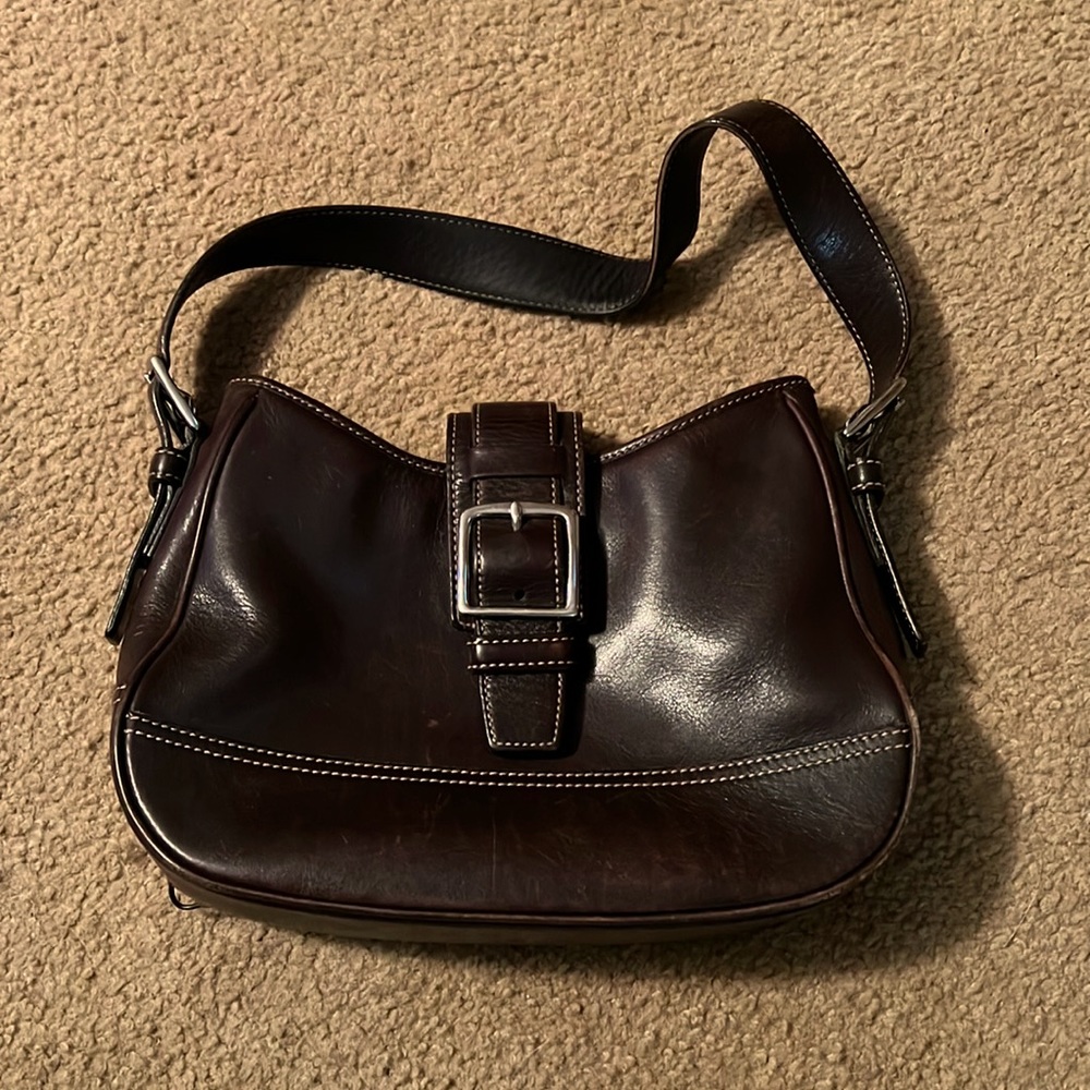 My first coach purse. Bought brand new 20 years ago. It has a few miles on it.
